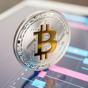 Bitcoin Cryptocurrency On The Tablet