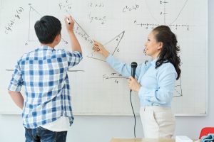 Math teacher explaining topic
